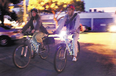 Jessi and McK show off their BikeGlow lights